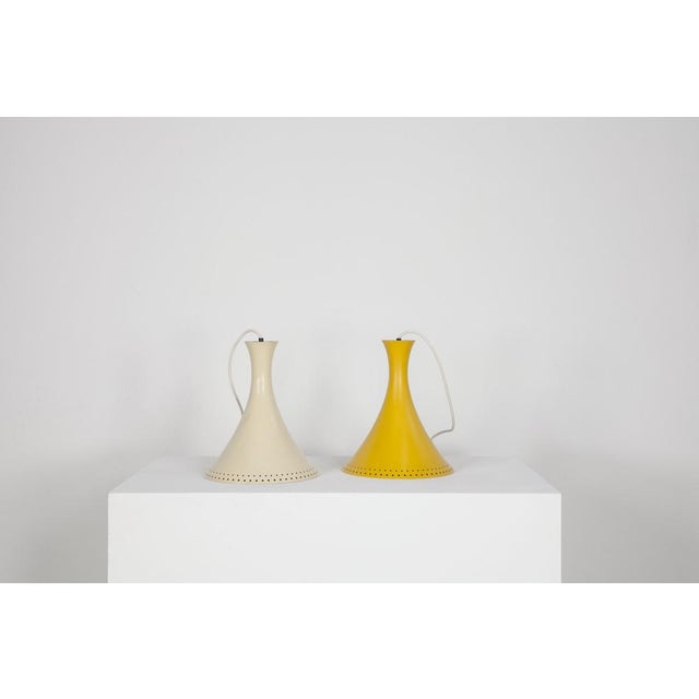 Pretty vintage hangover couple from the Italian 50s. One of the two luminaires have been overwhelmed. Both lights have...