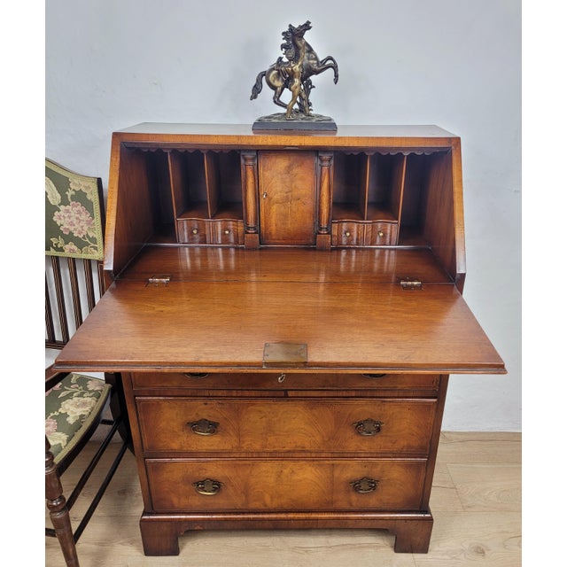 This is a wonderful Edwardian walnut bureau desk that has a timeless period charm. Circa 1910. A handsome original...