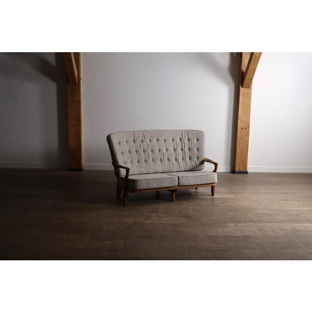 Refined ‘Juliette’ sofa designed by Guillerme et Chambron for Votre Maison, France, 1960s. This vintage French sofa...