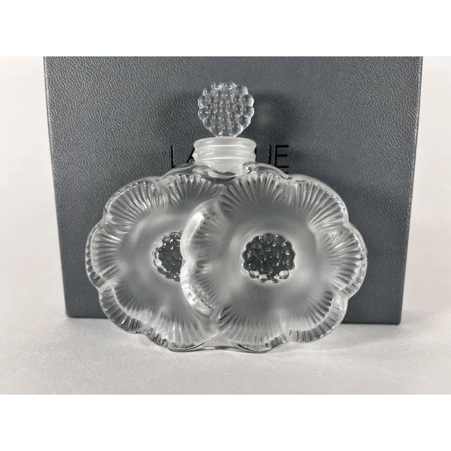 Created in 1935 by René Lalique, this vial which was originally in glass, it has been proposed in transparent and crystal...