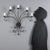 Five-light wall sconce crafted in wrought iron, featuring a twisted and scroll design that evokes elegance and...
