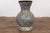 An artisan Prem Collection ceramic vase with nice rounded shape, black ground, white dripping décor and black glazed...