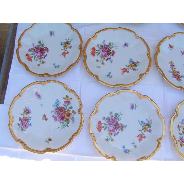 A wonderful set of 12 antique dessert service made by one of the finest Limoges manufactures, Coiffe. These fine porcelain...