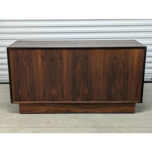 Listed is a very nice high figured rosewood credenza. This credenza has great proportions and is a great piece for just...