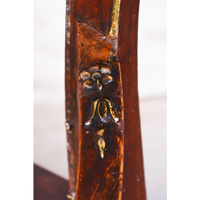 This Empire-style sofa from the early 19th ceThis Empire-style sofa from the early 19th century was crafted in Austria and...