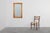 A characterful mid‑19th‑century English mirror in solid walnut, presenting a warm, naturally aged patina and a simple,...