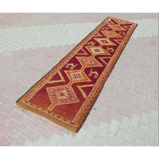 This beautiful, traditional vintage, handknotted Turkish runner is approximately 60 years old. It is handmade of very fine...