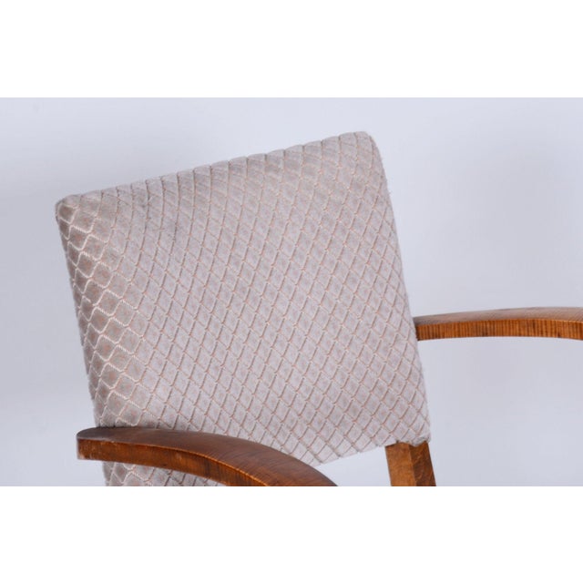 This chair originating from the 1930s represents an exceptional and highly valued example of French design production...