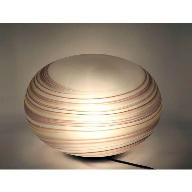 'Giove' lamp in Murano blown glass by VeArt, 1970s. Glass with blown rods in the tones of brown, base in painted metal....