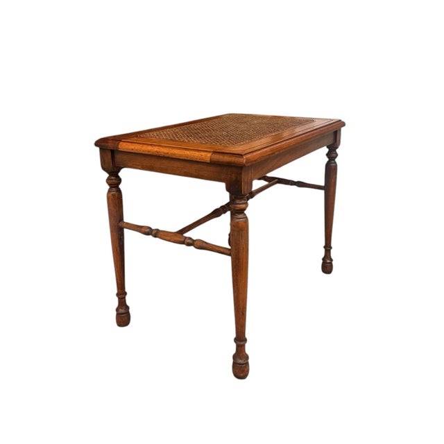 The vintage wooden decorative bench features a classic design with a rich, polished finish that showcases the natural...