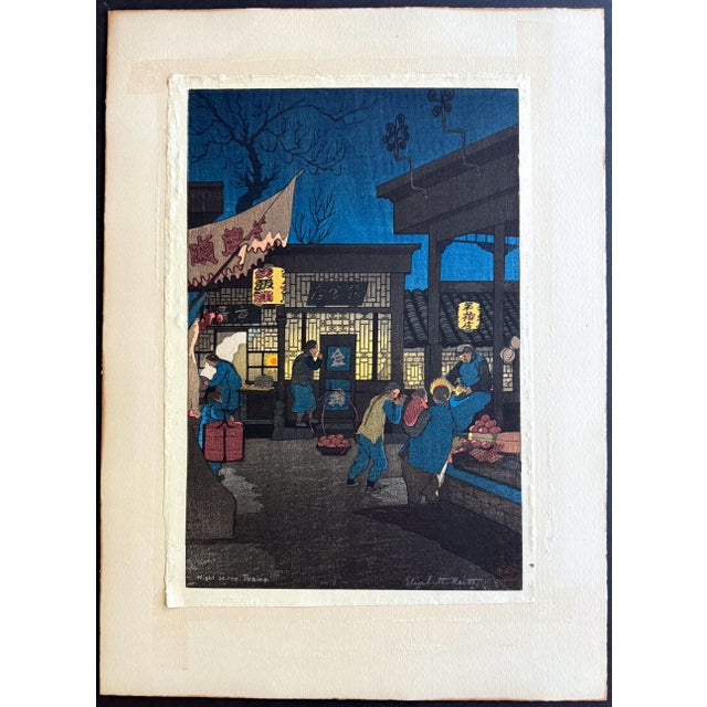 A Japanese woodblock print titled "Night Scene Peking" by Elizabeth Keith (1887-1956) 1922, The color woodblock print was...