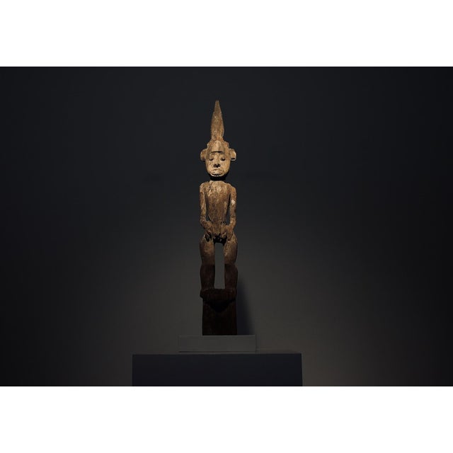 Hampatong protective figure of the dayak people of borneo, carved from dense ironwood. Antique work dating from the 19th...