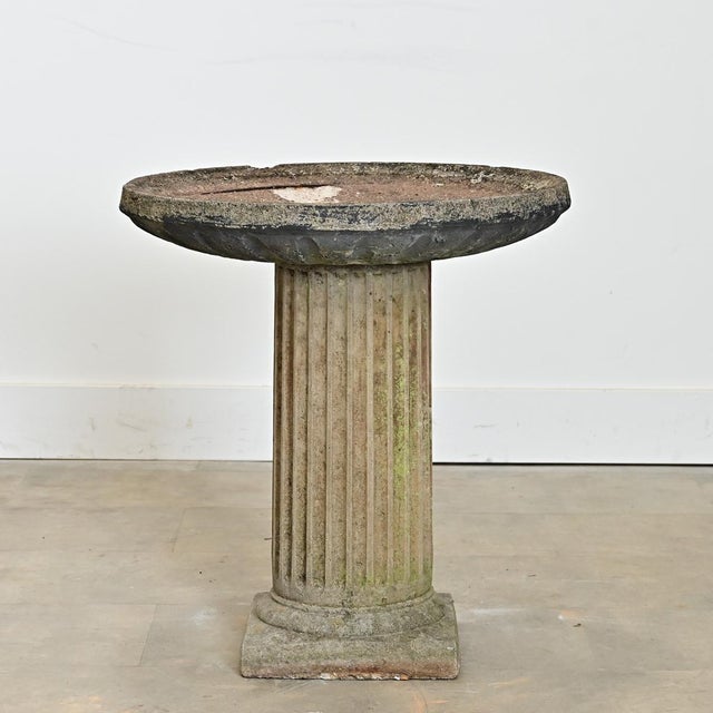 A sublime late 19th century English, cast stone bird bath for Neoclassical beauty in any garden or patio that both people...
