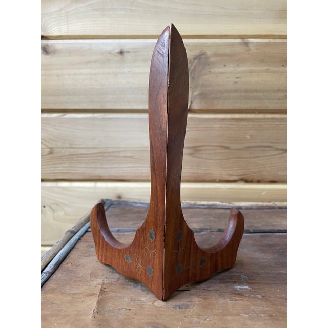 A nice vintage solid wood collapsible plate/picture stand, with lovely floral brass inlays.