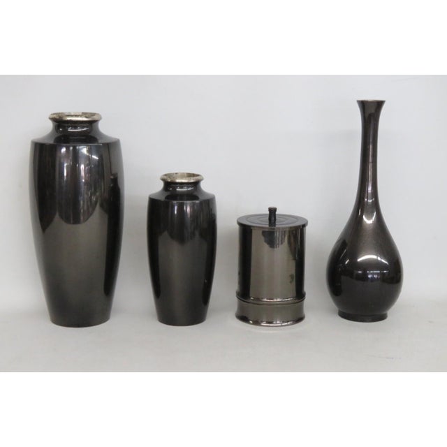 This gorgeous Set of 4 Vessels is made out of metal. This stunning set presents a Japanese chokin-style design; each piece...