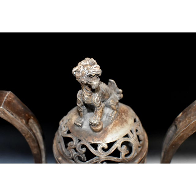 This beautiful antique white brass incense burner has a traditional round body, a high neck and dramatic handles. The lid...