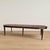 Impressive Louis XVI style dining table featuring an elegant oval ended top veneered in richly figured flame mahogany,...