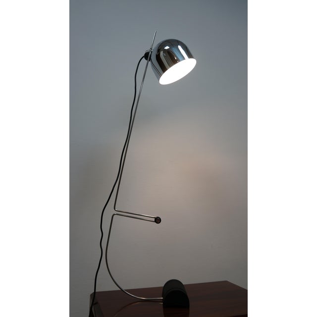 Elevate your living space with this exquisite adjustable table lamp, a stunning creation by the renowned designer Vid...