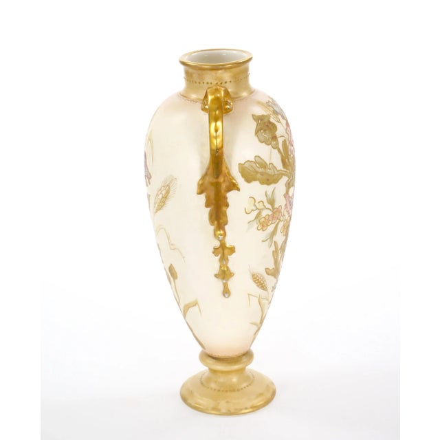 This exquisite antique vase, crafted in the 19th century by the esteemed Royal Bonn Company in Germany, is a splendid...