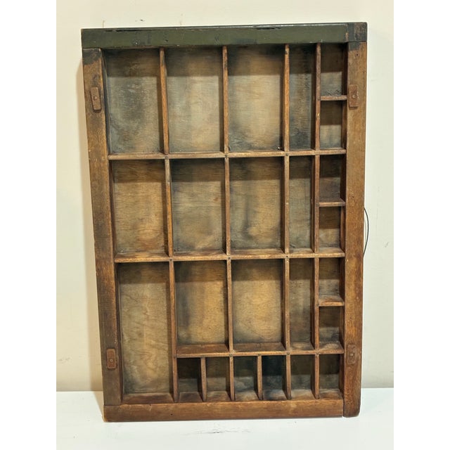 Small antique printer’s type case drawer, circa 1900. Solid wood with original green cabinet edge and varied compartments....