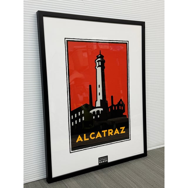 Design Plus Gallery presents an Alcatraz Golden Gate National Parks framed print. The graphic composition depicts the...