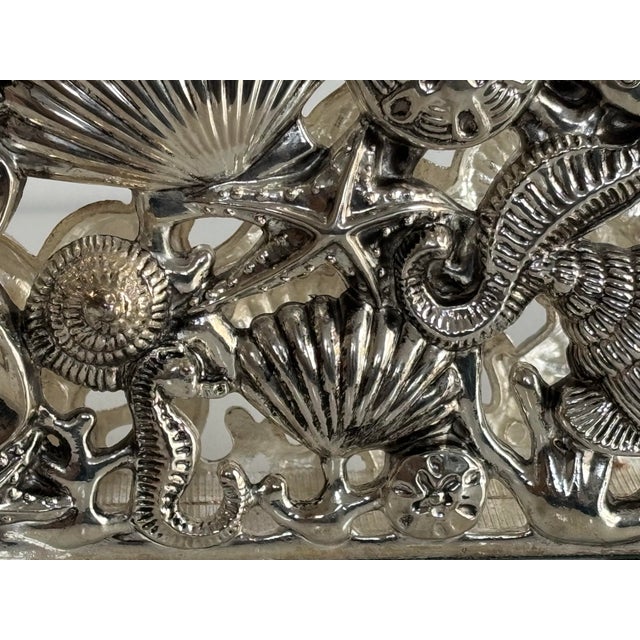 A 1990s Godinger Silver Co. napkin or letter holder in a whimsical under-the-sea motif. Perfect for a seaside or coastal...