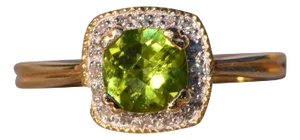 The Zhu: Peridot and Natural Diamond Halo Ring in Yellow Gold