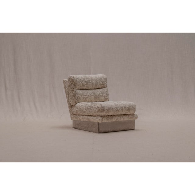 A refined “California” easy chair designed by Jacques Charpentier in France during the 1970s. This model reflects the...