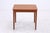 Extendable dining table by Poul Hundevad for Hundevad & Co. with clean lines and beautiful teak grain. The two integrated...