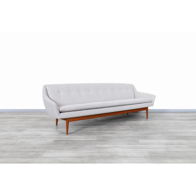 A beautifully sculpted example of mid-century modern design, this Norwegian teak sofa by Gerhard Berg for LK Hjelle brings...