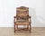 An exceptional Louis XV armchair from Tuscany, crafted in solid walnut during the first half of the 18th century. Entirely...