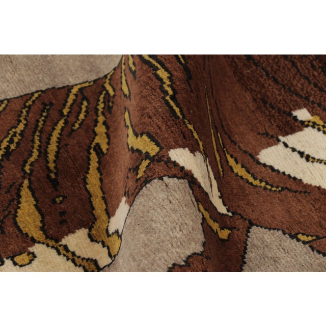 Hand-knotted in wool and originating circa 1950-1959 from Afghanistan, this 3x5 vintage Gabbeh rug joins Rug & Kilim’s...