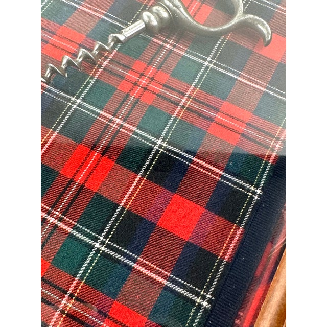 A distinctive and highly collectible presentation featuring a curated arrangement of antique corkscrews, artfully mounted...