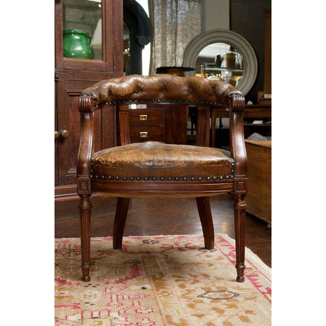 Tufted Leather and Mahogany Barrel-back Library Chair, English circa 1860.