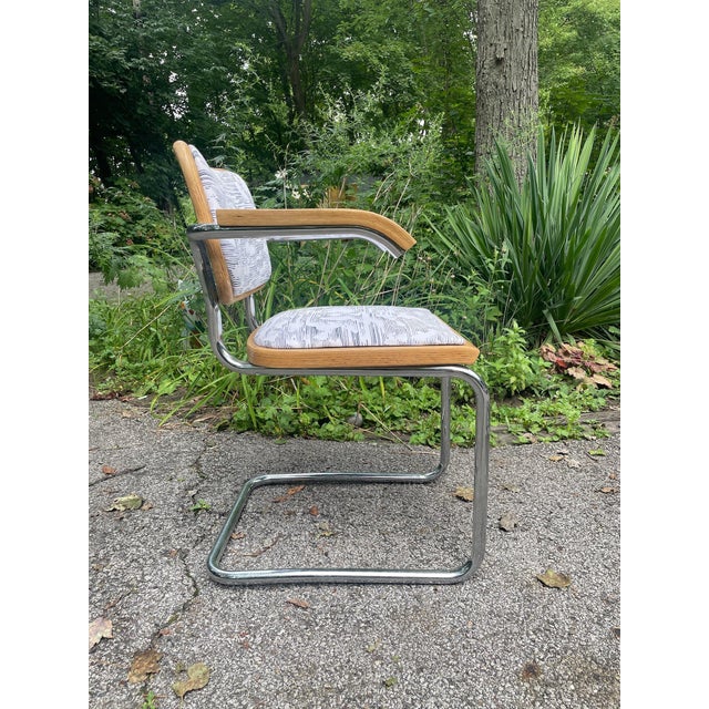 Set of six vintage Cesca-S64-style cantilever dining chairs with tubular chrome frames, light wood trim and upholstered...