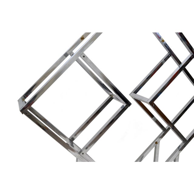 Vintage chrome geometric diamond shaped étagère attributed to Milo Baughman. The glass shelves will be custom-made prior...