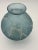 An exceptional and authentic "Milan" vase designed by René Lalique in 1929. Characterized by a globular form enveloped in...