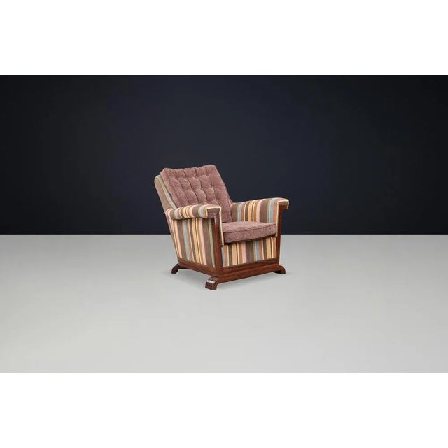 Large Art Deco Armchair in Reupholstered Fabric and Walnut, Prague, 1930s This impressive large-size Art Deco armchair is...