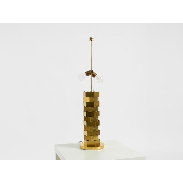 A unique, large, and heavy brass table lamp from the 1960s by vereinigte werkstätten. the lamp is made entirely of brass,...