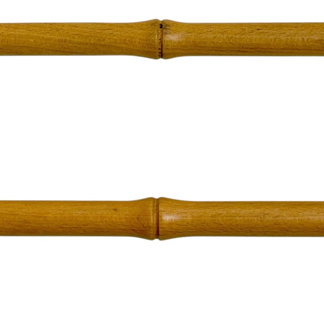 A classic vintage double towel bar crafted in the timeless faux bamboo style, featuring warm-toned wood with carved bamboo...