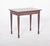 Side table in mahogany. Rectangular, it has straight edges and a flat surface, slightly marked by signs of use such as...