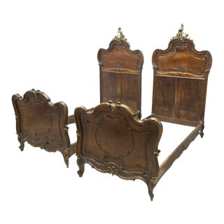 Early 1900s Italian Louis XV Style Carved Walnut Beds Set of Two For Sale