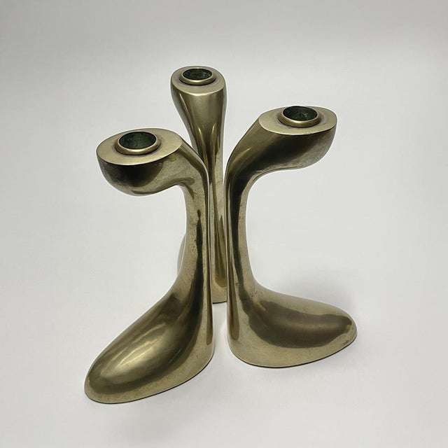 Trio of brass candlesticks with original felt pads. Circa 1960 Total weight: 1900 g Dimensions of one candlestick: Length:...