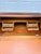 A charming French 19th century Louis XVI solid walnut secretary, featuring a slanted writing front, three drawers,...