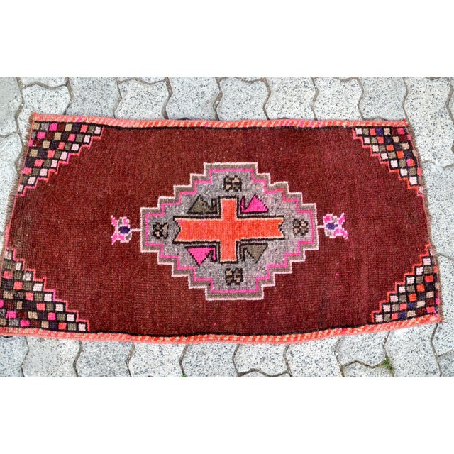 This is a vintage Turkish Oushak rug from the 1960s. The piece was hand-knotted.