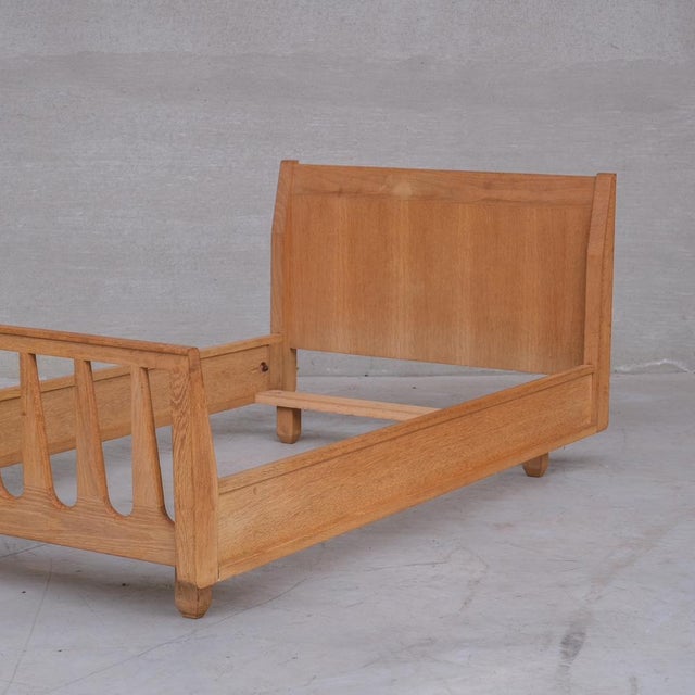 A single day bed by guillerme et chambron. france, c1960s. oak. good vintage condition, occasional scuffs and signs of...