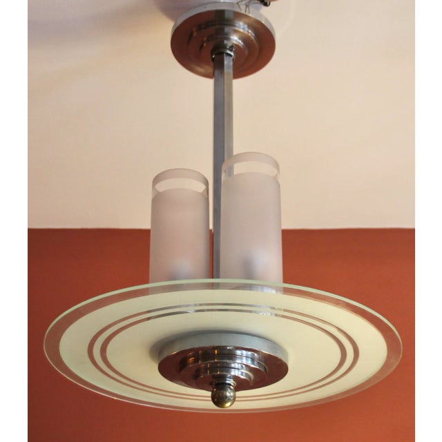 Rare and very high quality version of a modernist Art Deco ceiling light with a horizontal partially etched glass pane...