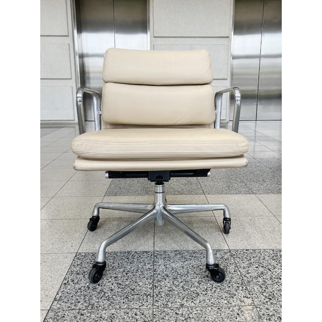 Comfort and ease characterize the spirit of this desk chair, attributed to designers Ray and Charles Eames for Herman...