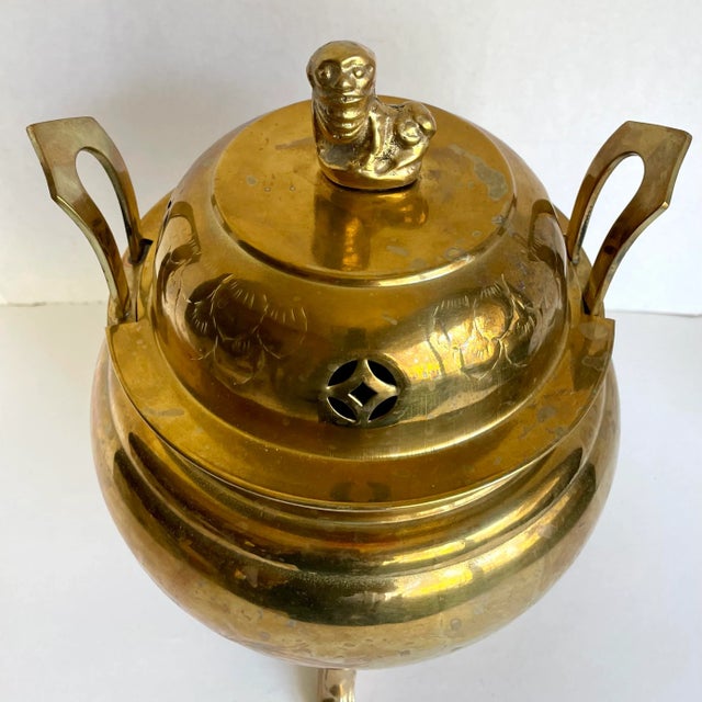 Here is a gorgeous brass piece that is made for incense burning. It sits on 3 decorative legs and has an amazing pair of...