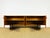Magnificent Scandinavian teak sideboard dating from the 1960s. Comprising four storage doors with shelves, this piece...